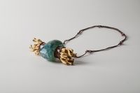 Laichzeit, 2021, pendant, fluorite, rutile quartz, wood, fishing line